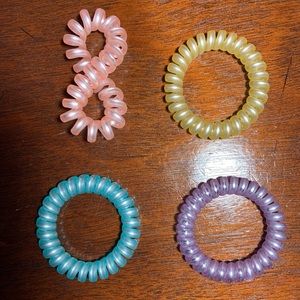 Yellow, pink, purple & blue spiral hair ties!